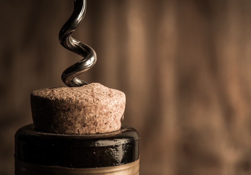 Wine Bottle Being Uncorked